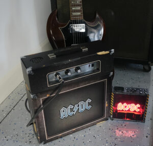 The Power Up lightbox in action next to AC/DC boxset amplifier.